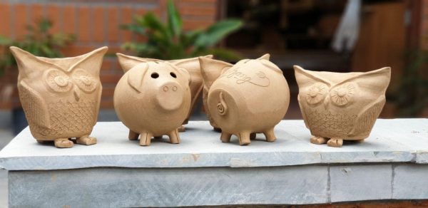 Custom owl and piggy banks by studio Maato